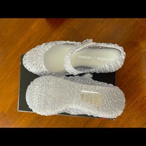 Brand New in Box with cover are Mini Melissa in glitter clear Campana in size 12